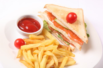 sandwich with french fries and sauce
