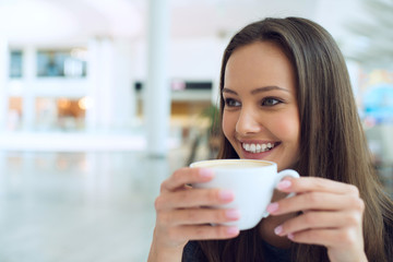 woman drinking coffee in the morning