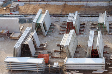 Grey concrete slabs preparing for building under construction, t