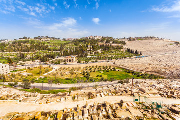 Fototapeta premium Mount of Olives and the old Jewish cemetery in Jerusalem, Israel. Gethsemane and Church of Mary Magdalene foreground.