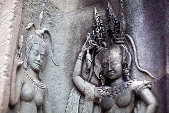 Ancient bas-relief with Apsaras in Angkor Wat, Cambodia