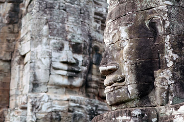 Fototapeta na wymiar Giant stone faces at Prasat Bayon temple in Angkor Thom, Cambodia