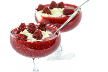 Delicious raspberries with whipped cream