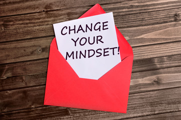 Fototapeta na wymiar Change your mindset words on paper