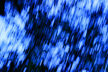 Blue blurred background consisting of dashed lines
