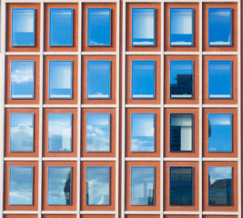Exterior of modern office building in red bricks 