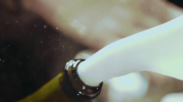 Splashing of the champagne in slow motion