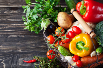 Basket with assortment of vegetables Copy space