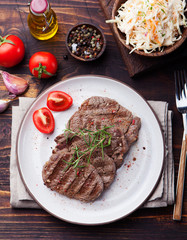 Grilled beef tenderloin meat with cole slaw salad