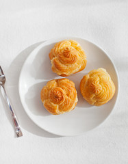 Profiteroles, choux with a custard cream
