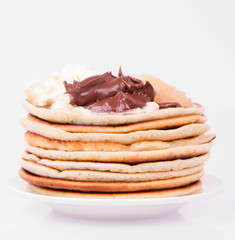 Pancakes with braised apples, mascarpone cheese and chocolate