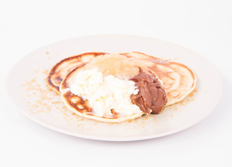 Pancakes with braised apples, mascarpone cheese and chocolate