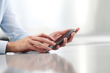 hands with cell phone