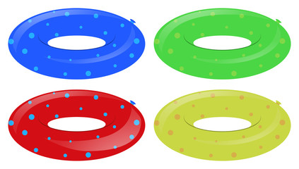 Four swim rings in different colors