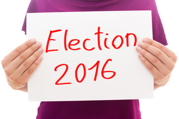 Girl holding white paper sheet with text Election 2016