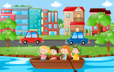 Naklejka premium Kids rowing boat in the river