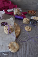 Cookies with berry, chocolate cream and hazelnuts