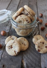 Cookies with berry, chocolate cream and hazelnuts
