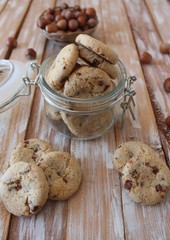 Cookies with berry, chocolate cream and hazelnuts