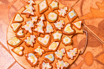 Gingerbread colorful decorated cookies - Christmas trees, hearts, star