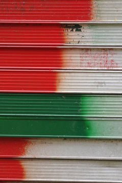 Red and green lines on the metal abstract