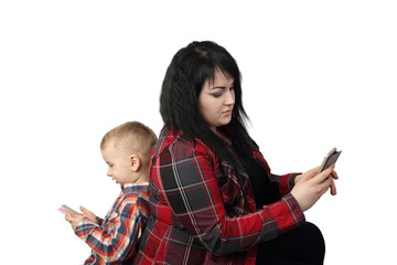 Black haired woman sits back to back with small boy, both hold smartphones in hands - Mother and little son isolated on white background - Communication inside family