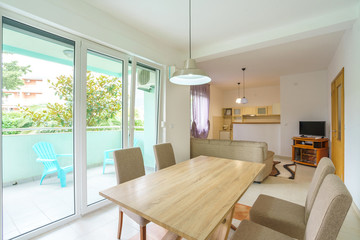 Interior of a guest house kitchen with dining zone