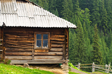 Nature wooden houses in a Carpathian mountains.