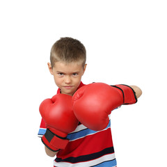 Little boy in boxing gloves with harsh facial expression isolated on square white background