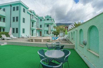 Public open swimming pool in the hotel yard