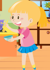 Girl holding spoon and bowl