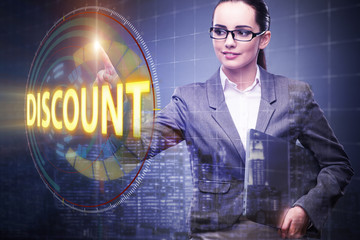 Businesswoman pressing buttons in sale concept