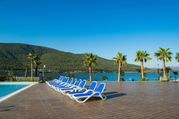 Nice swimming pool outdoors on bright summer day