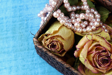 Dried roses and pearls
