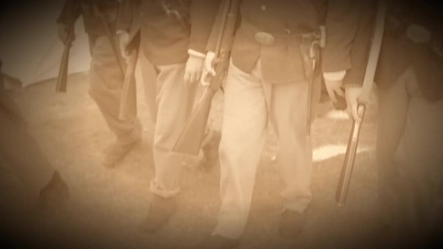 Marching Civil War soldiers come to a full stop (Archive Footage Version)