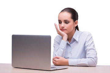 Businesswoman at her working desk with laptop