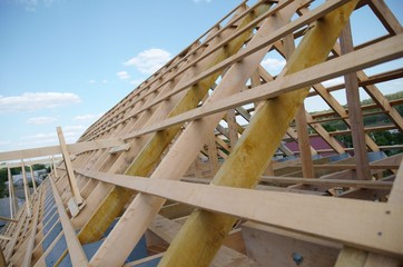 new home currently under construction and  wooden rof
