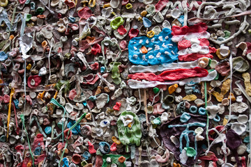 American Flag made out of chewing gum stuck to wall
