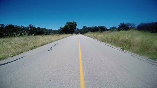 In the middle of the road driving POV.