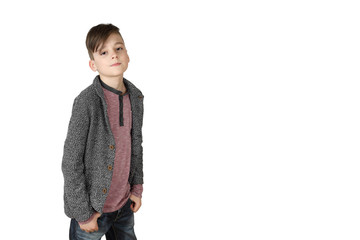 Fototapeta premium Teenage boy stands isolated on white background with copy space for text