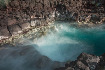 Naklejka premium Sunset along the Queens Bath area of Kauai, Hawaii