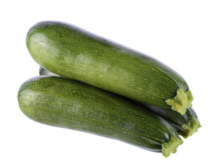 green zucchini vegetables isolated on white