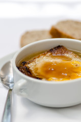 Hot soup with onion and cheese