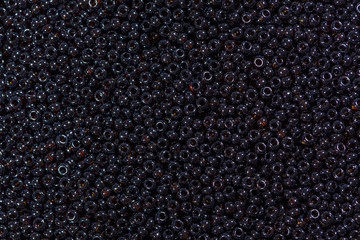 Dark blue beads with yellow shade.