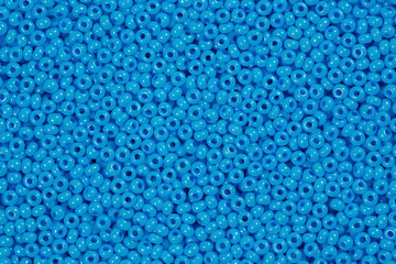 Beads of blue colour close-up.