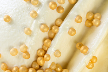 Creamy oce-cream with sugar candies.