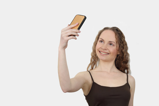 Pretty woman makes selfie