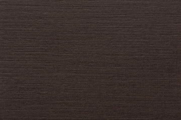 Close up of dark brown paper texture background.