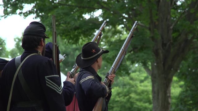Civil War soldiers firing a volley