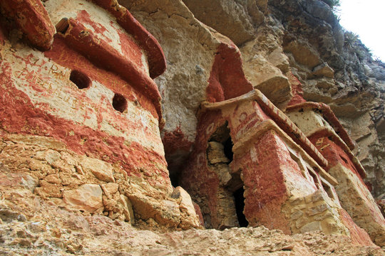 Pre inca mausoleum Revash in the mountains of northern Peru. Famous for the built in the wall and for the colorfull red and brown paintings.